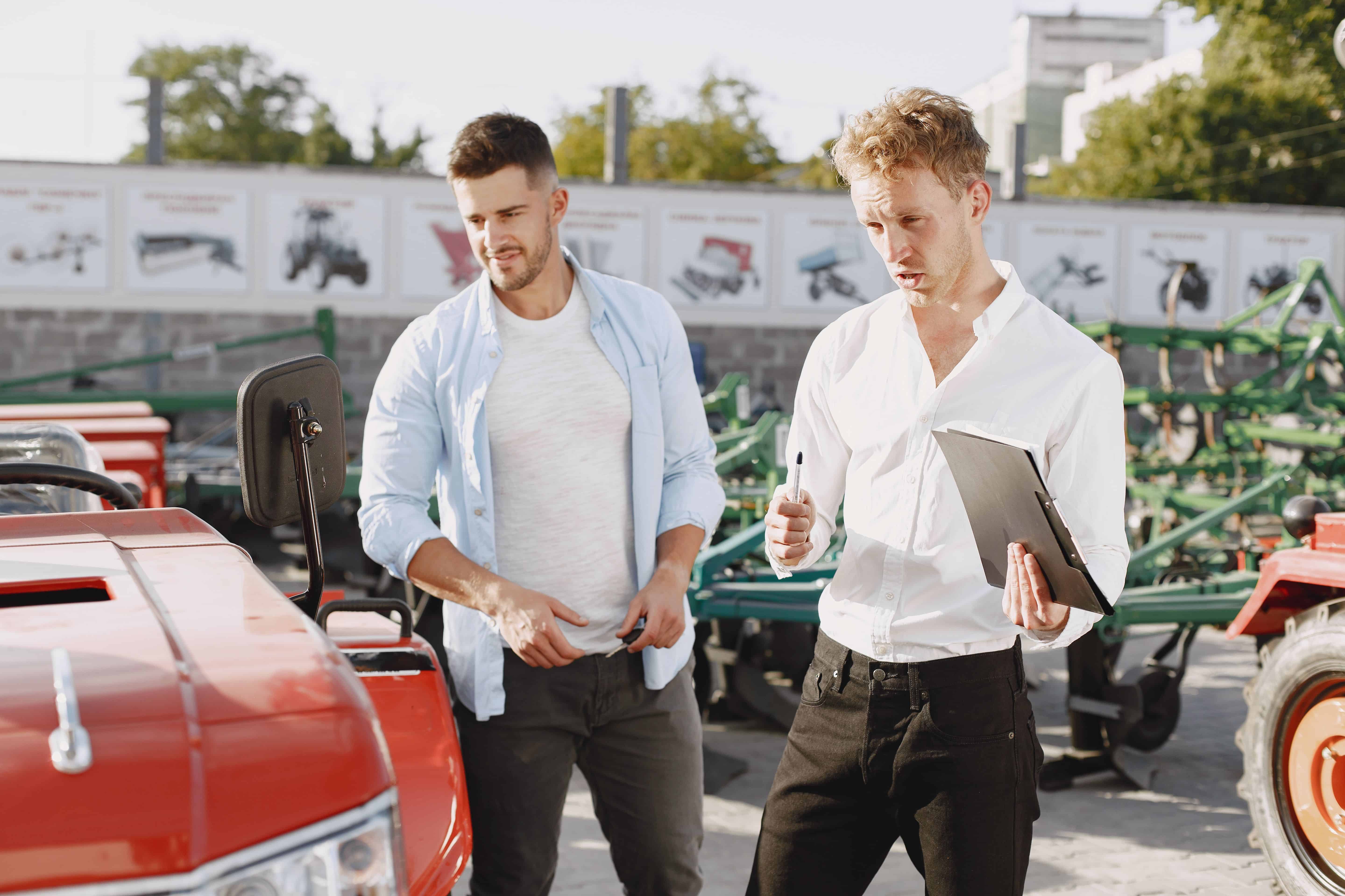 Business owner reviewing asset finance options for equipment with a broker.